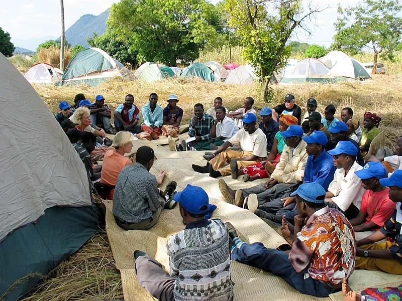 Pastors drinking in teaching with our visiting team's tents in the background