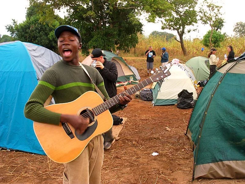 Norberto, one of the first boys we took in years ago, serenading our missionaries early in the morning with the joy of the Lord!