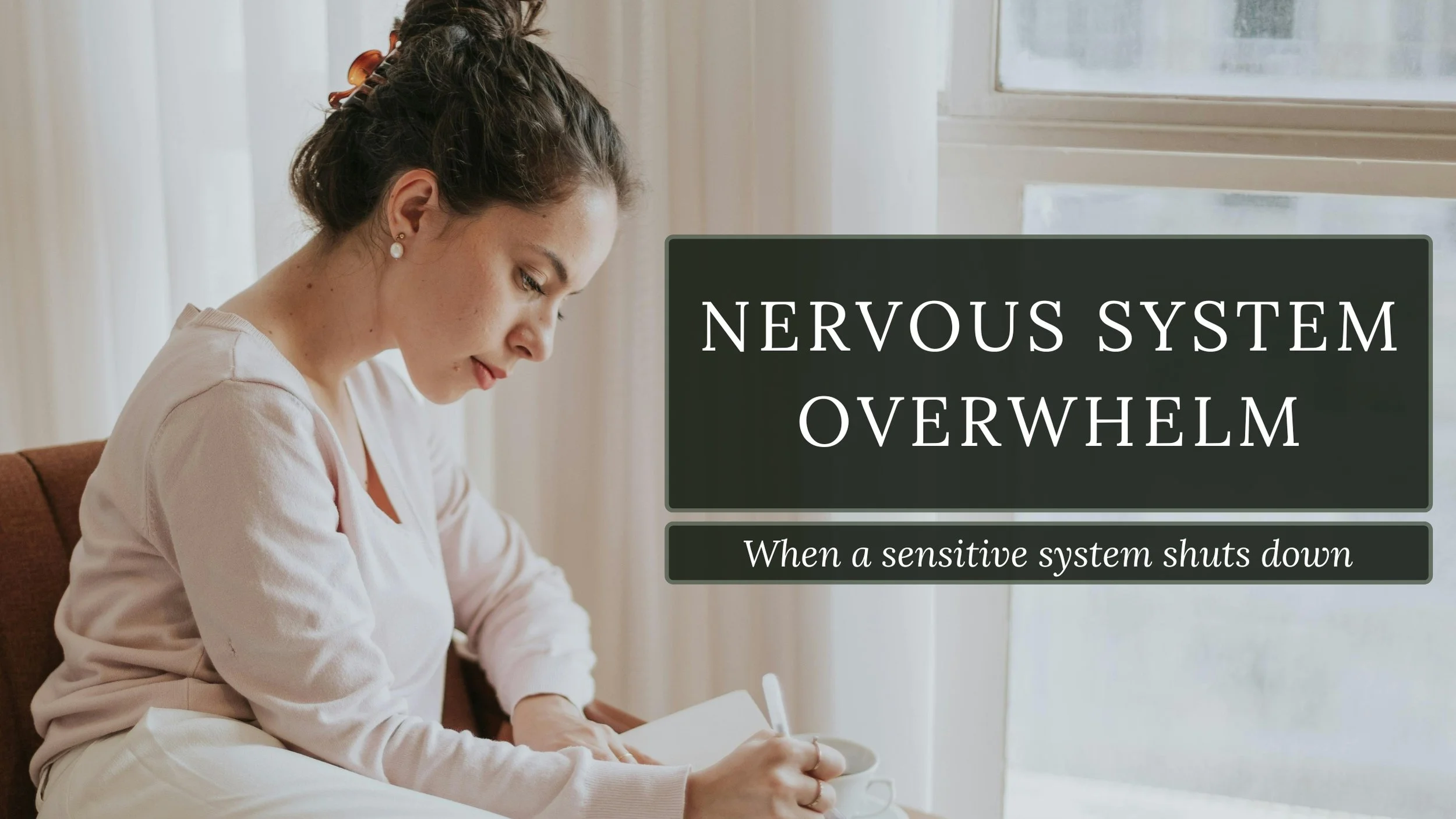 Woman journaling quietly by a window in soft natural light, reflecting nervous system overwhelm and depletion