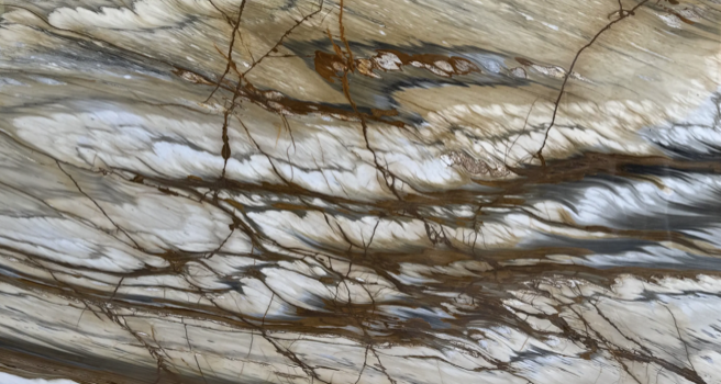 Rare natural stone slab with dramatic movement and unique mineral coloration.