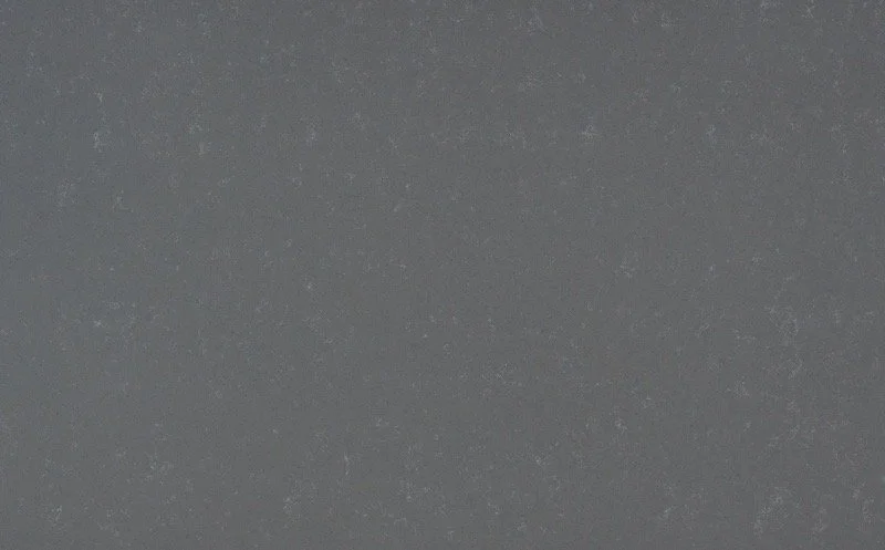 Close-up of a gray textured surface, possibly metal or concrete.