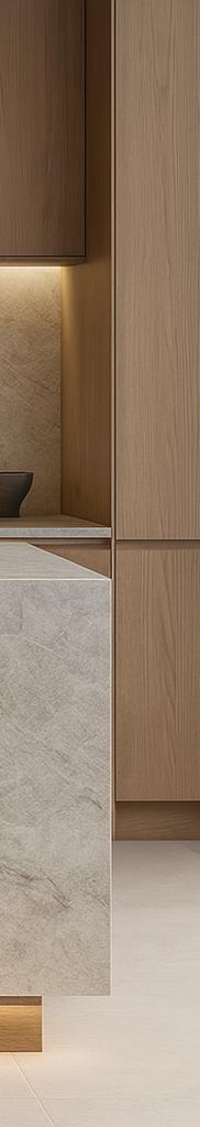 Close-up of a modern kitchen with wooden cabinets and a light-colored marble countertop.