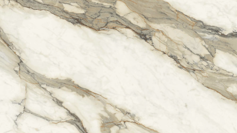 Close-up of a marble surface with cream, gray, and brown veins.