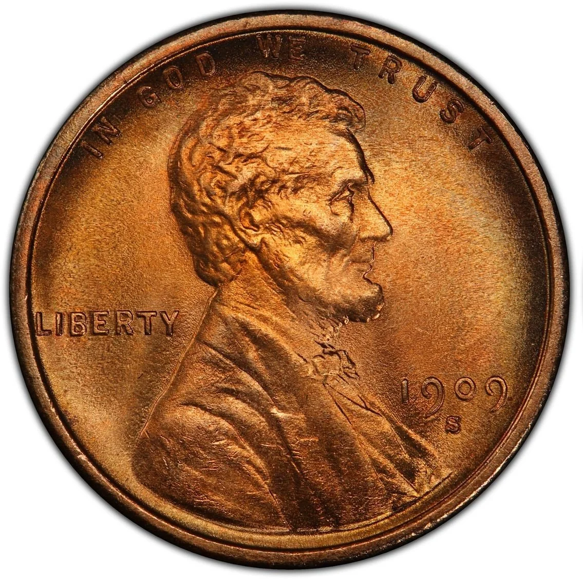 the face of a copper coin up close lincoln head 1909 date with an s and liberty, in god we trust