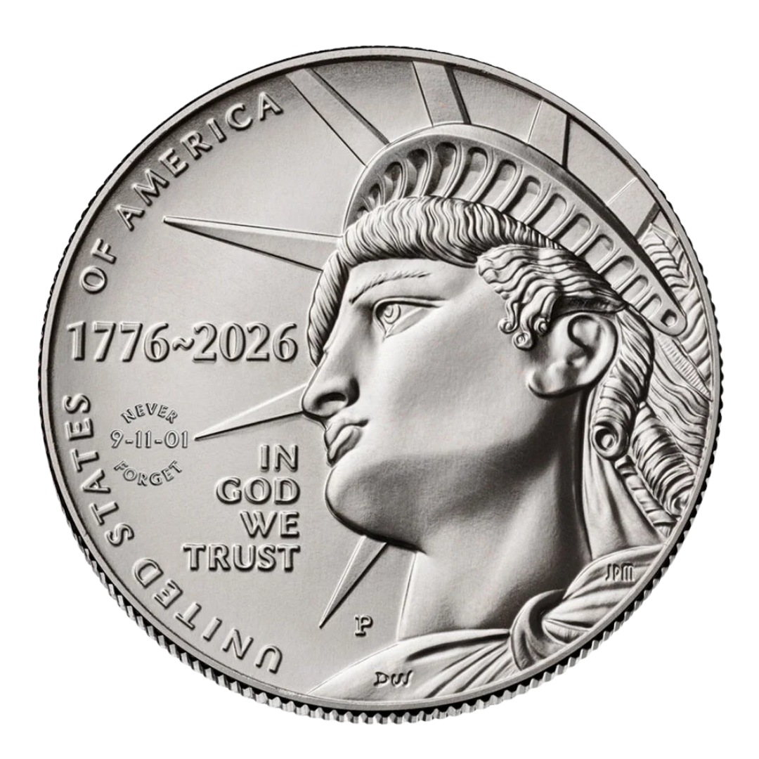 silver coin showing the statue of liberty's face in god we trust and never forget 9/11 markings