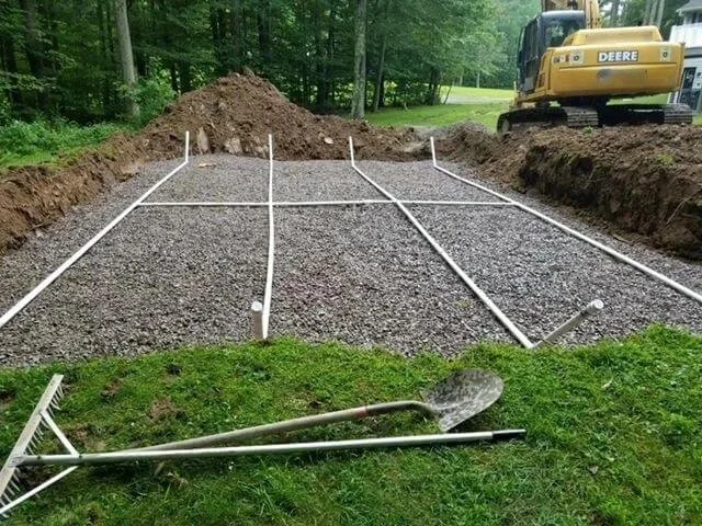 sand filter septic system with gravel base and PVC distribution lines