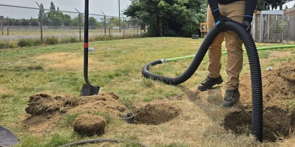 septic pumping service removing waste from underground tank