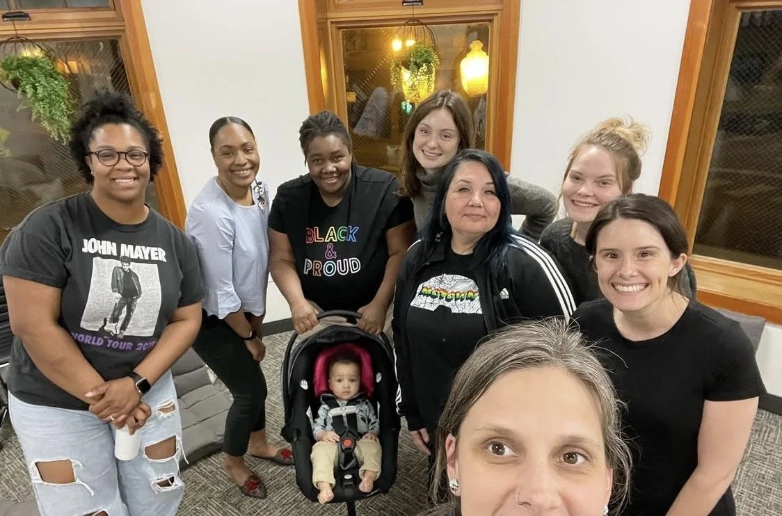 Group of doulas gathered in room