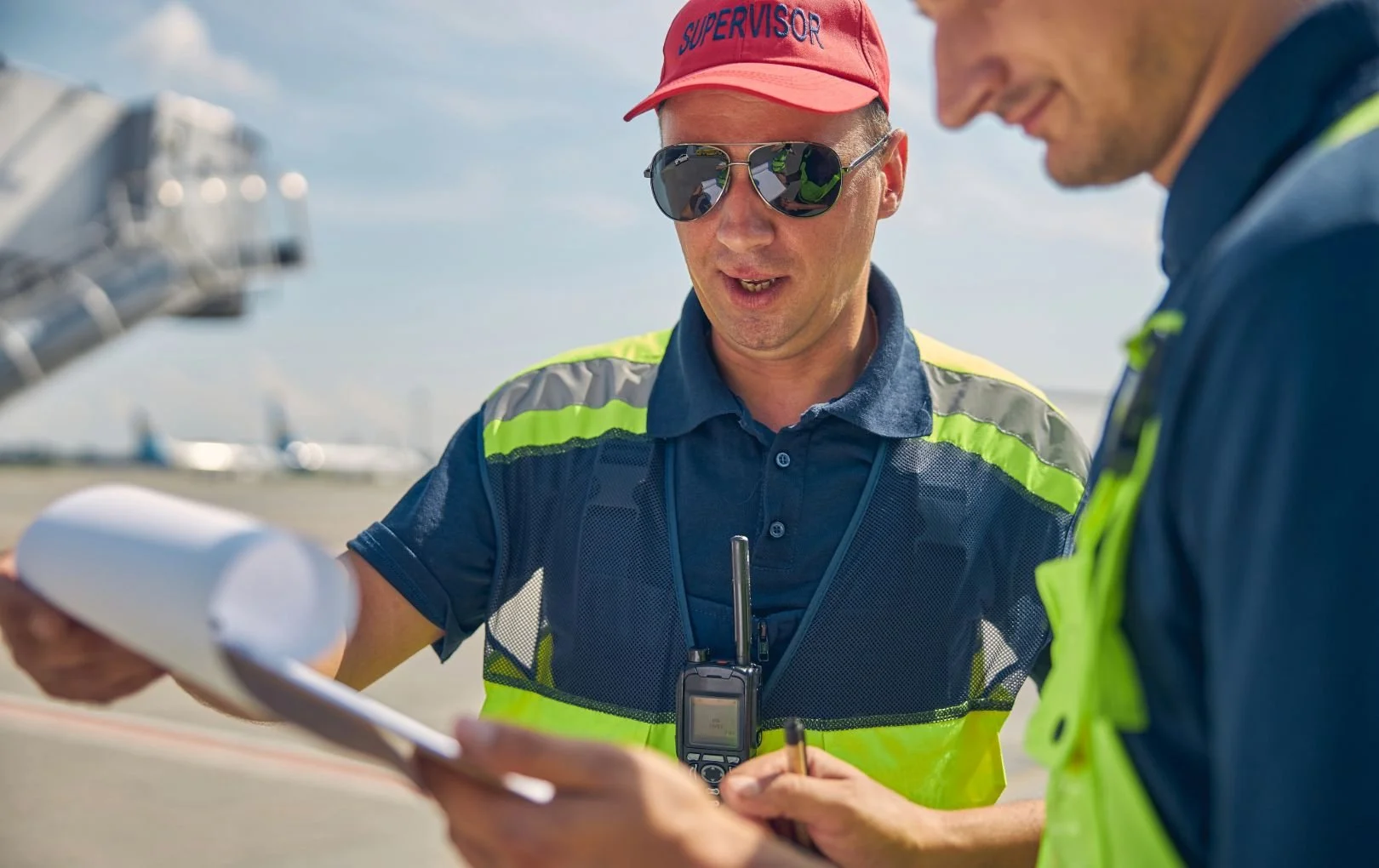 Systems engineer performing onsite work at airport airfield