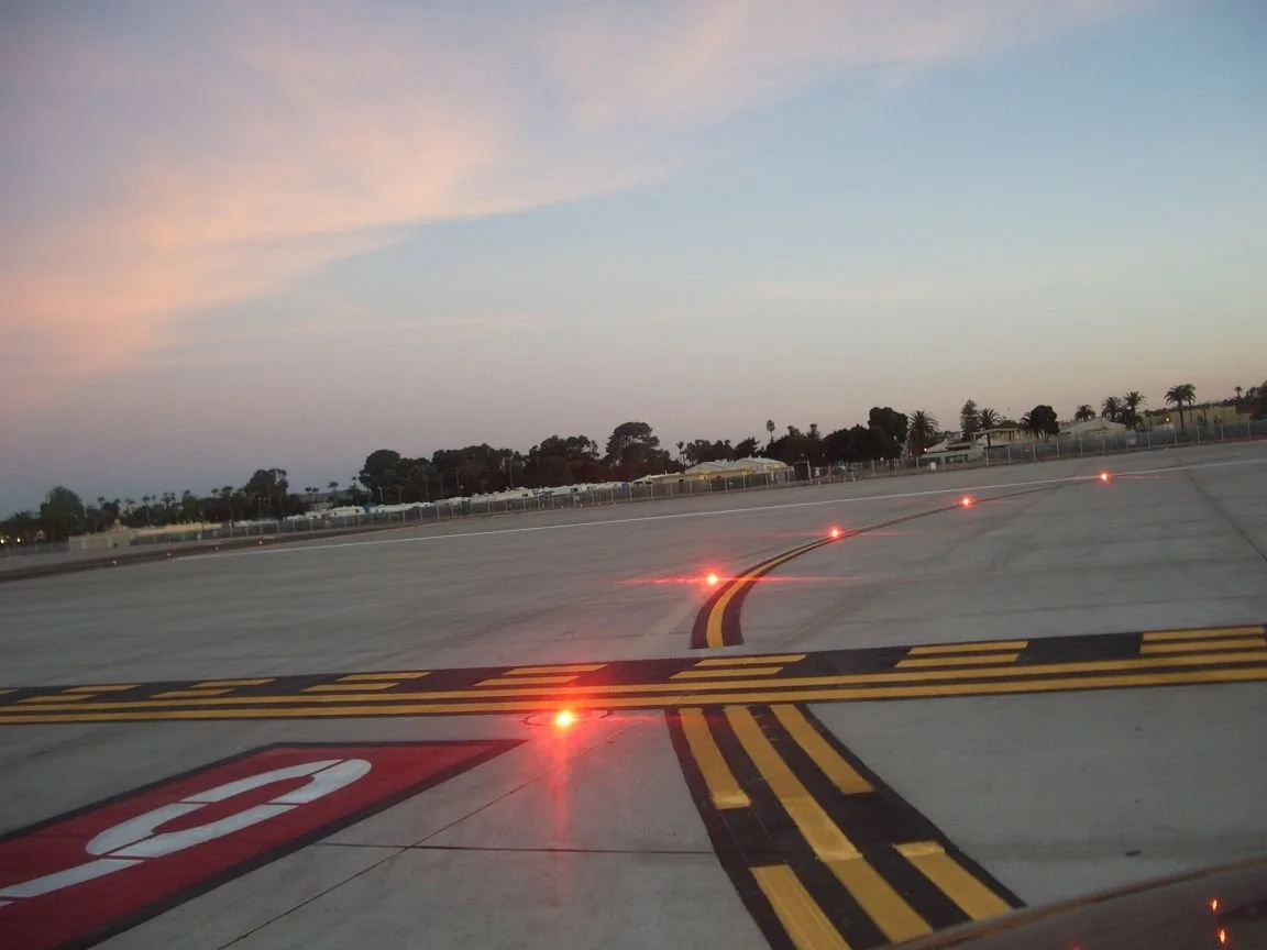 Runway entrance lights illuminated during daytime at airport