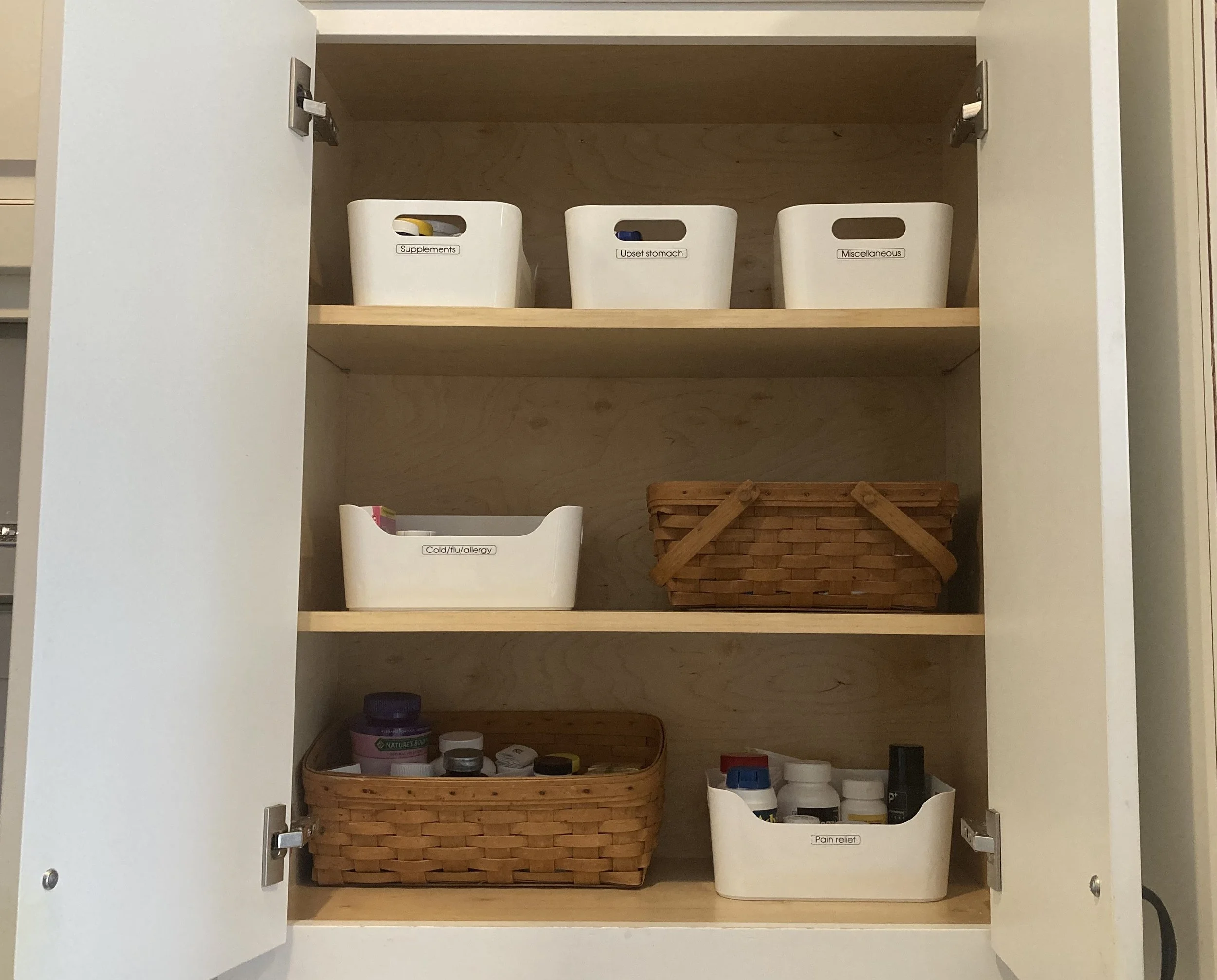 an organized pantry cabinet