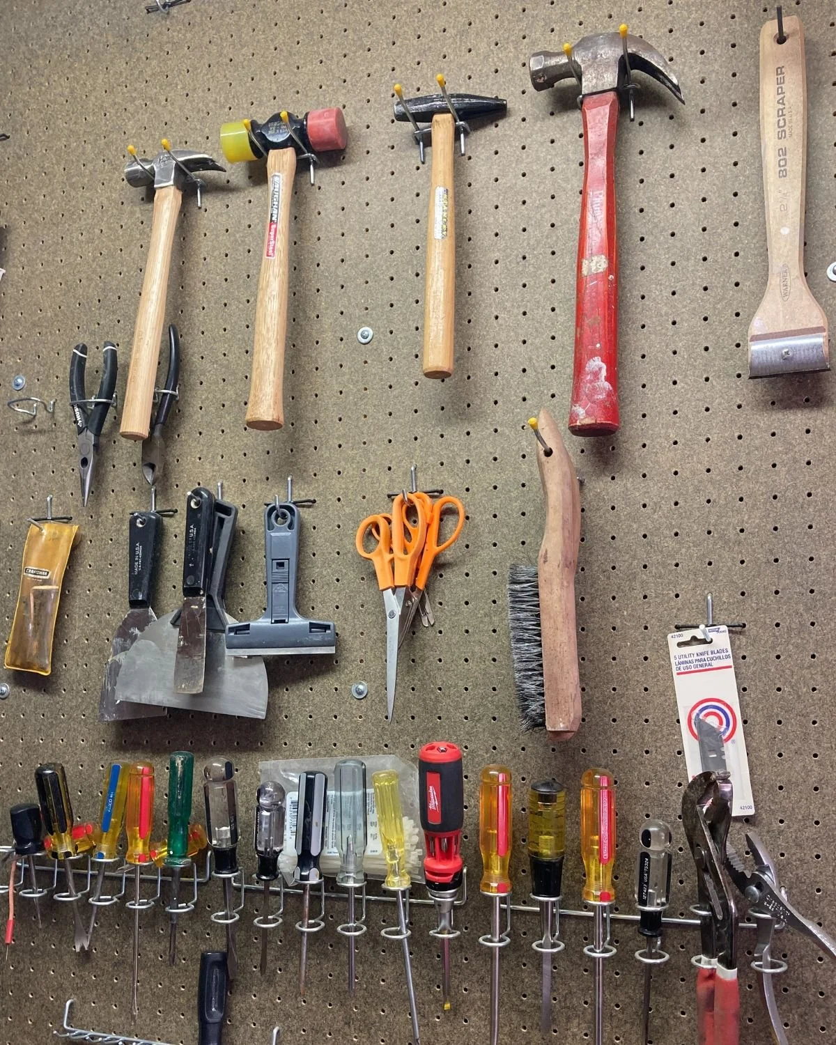 an organized garage pegboard
