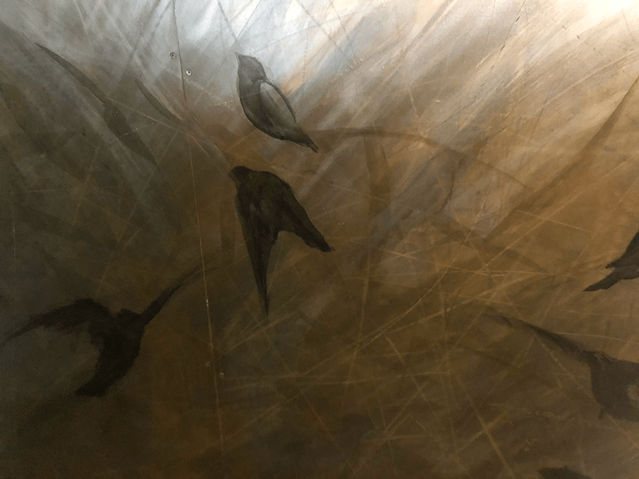 Birds in metal stain over patina