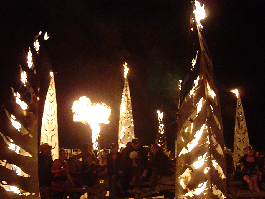 Propane poof (accumulator flame effect) on inner feathers. photo: Caroline Miller 2005