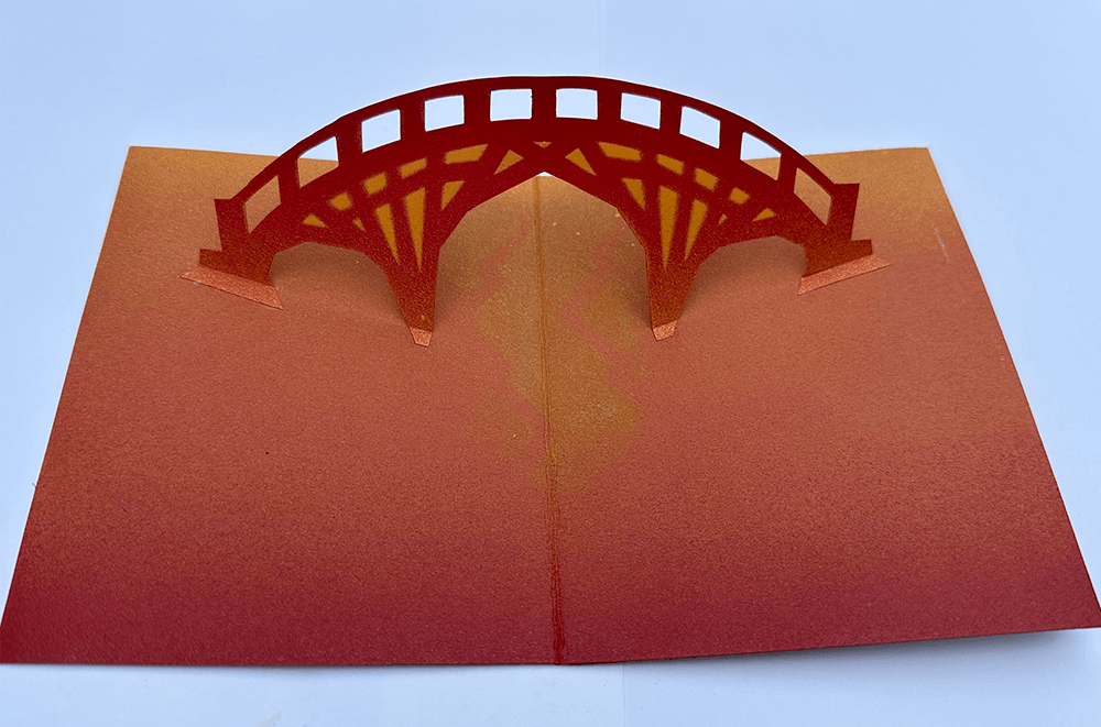 Home is Here bridge inside. Stencil, pop-up.