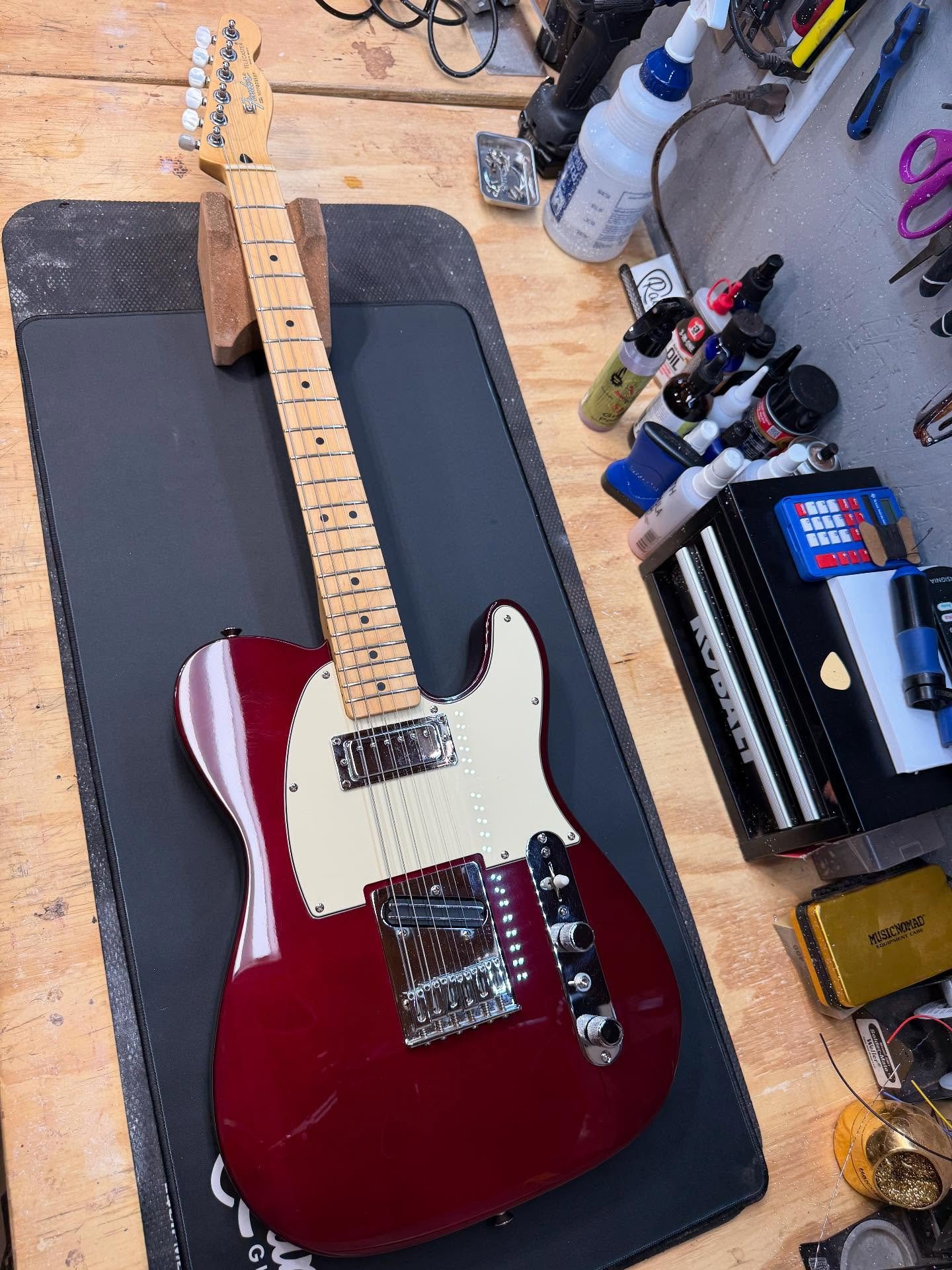 This beautiful red tele came in for some love. Needed a setup, a pick guard swap to cream (I think I prefer the cream) and had a loose wire and a couple shorts on the 5 way switch. Yep - 5 way on a 2 pickup tele. Plays great, sounds great! Swipe for