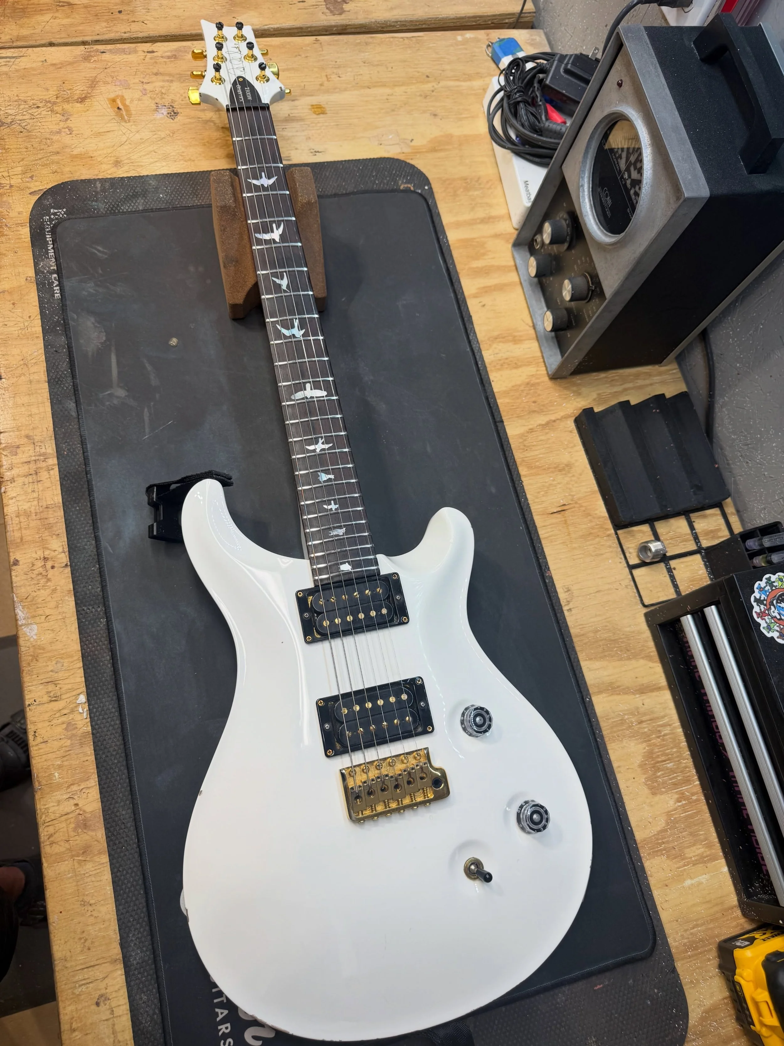 Sweet @prsguitars on the bench. This one came in for a fresh volume pot and left with a deep clean, polished frets and conditioned fingerboard. Love seeing guitars that are well played. It&rsquo;s less common to see PRS this worn in! Fantastic. #prsg