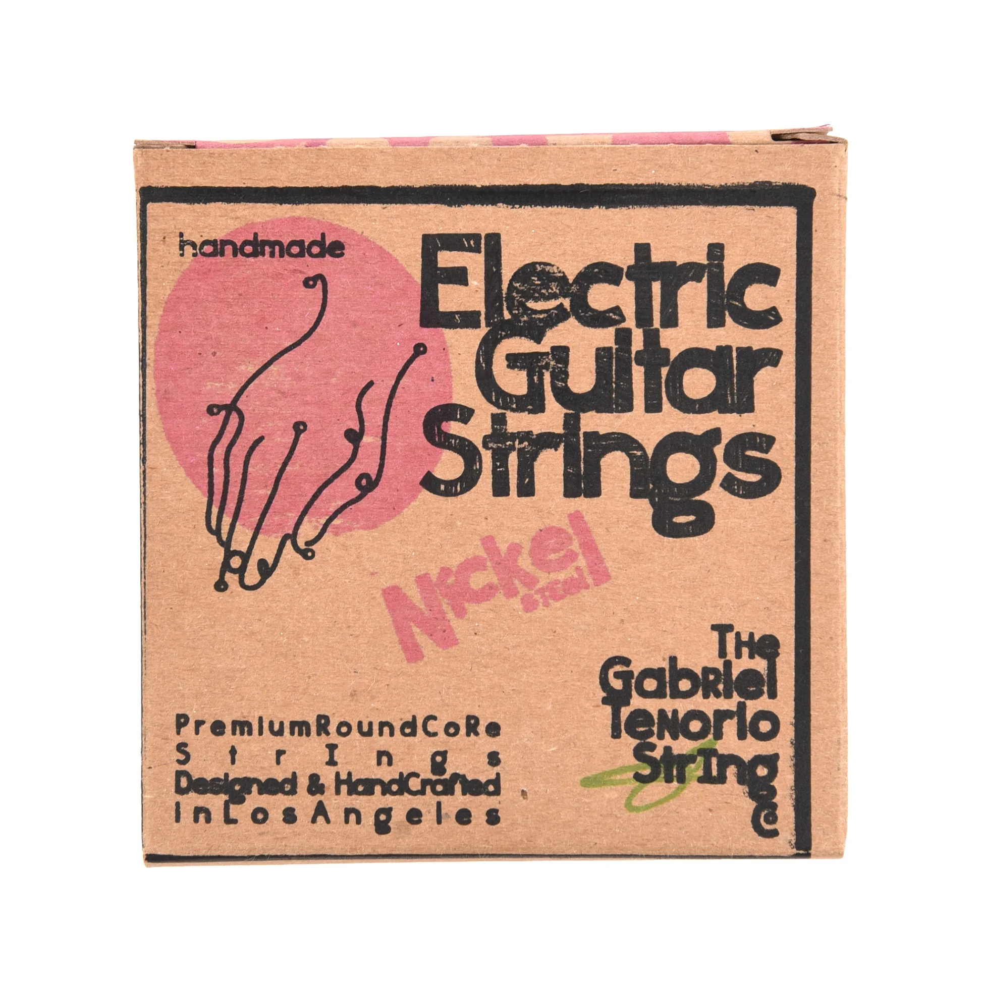 Close-up of a cardboard box for a handmade electrical guitar with handwritten text and a pink circle graphic.