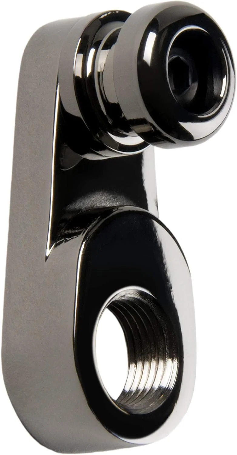 Close-up of a metal mechanical component with threaded holes, metallic and black finish.