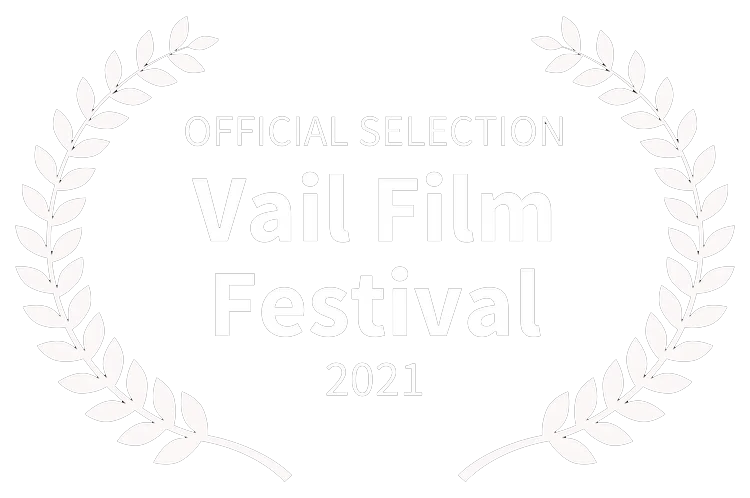 Laurel wreath surrounding text that reads "Official Selection Vail Film Festival 2021" in white against a black background.