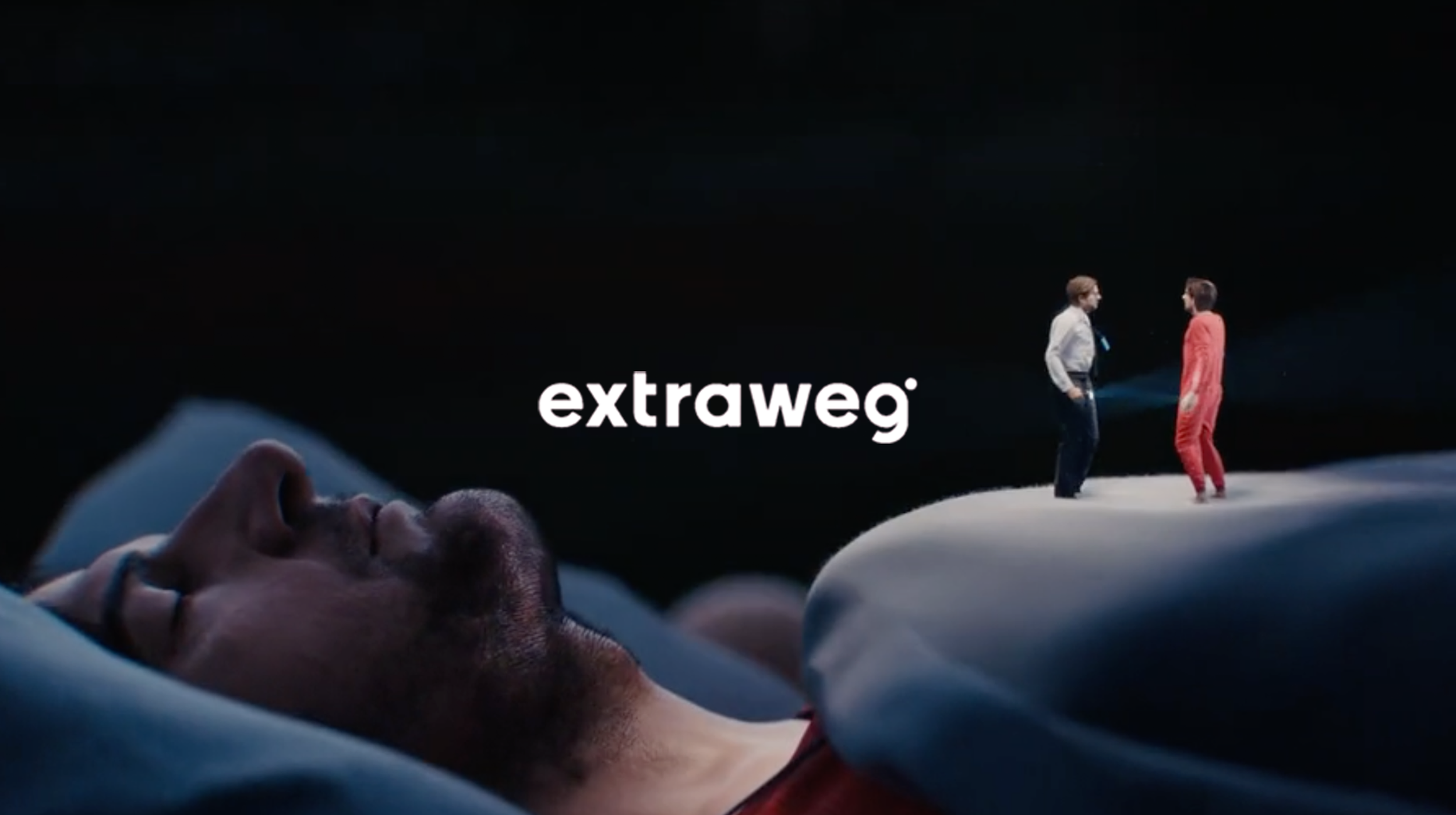 A person lying in bed with eyes closed, and two animated figures standing on a large pillow, with the word 'extraweg' in the center.