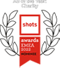 A black background with a red downward arrow shape featuring white and red text, including the words 'shots', 'awards', '2023', and '#more'.