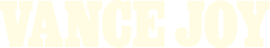 Close-up of the text 'VANGLJOY' in bold, black and white letters.