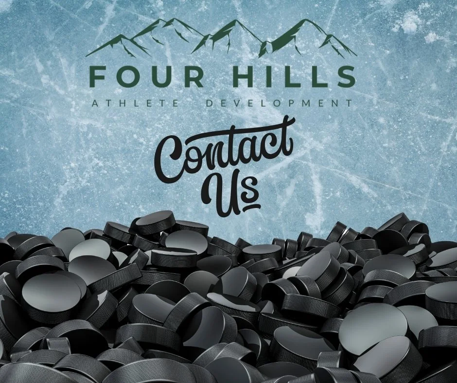 Collection of black hockey pucks on ice surface with a blue backdrop displaying the text 'Four Hills Athlete Development Contact Us' and a mountain graphic.