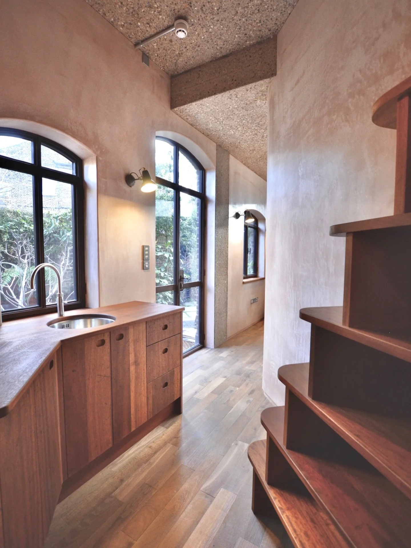 Tucked away down a quiet, secret mews in Islington, this little studio flat was designed and built within an existing client&rsquo;s home - a hidden pocket of calm in the city.
Every detail is considered, from bespoke reclaimed joinery to cleverly in