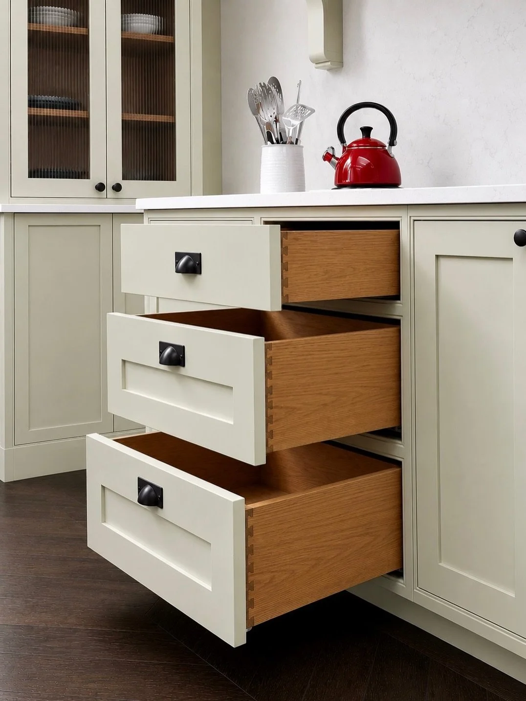 A closer look at the in-house joinery that runs through the heart of this countryside home.
Every drawer, cabinet and panel was designed and built by our own joinery team. Dovetail joints in solid oak, bespoke oak cabinets, painted shaker fronts in a