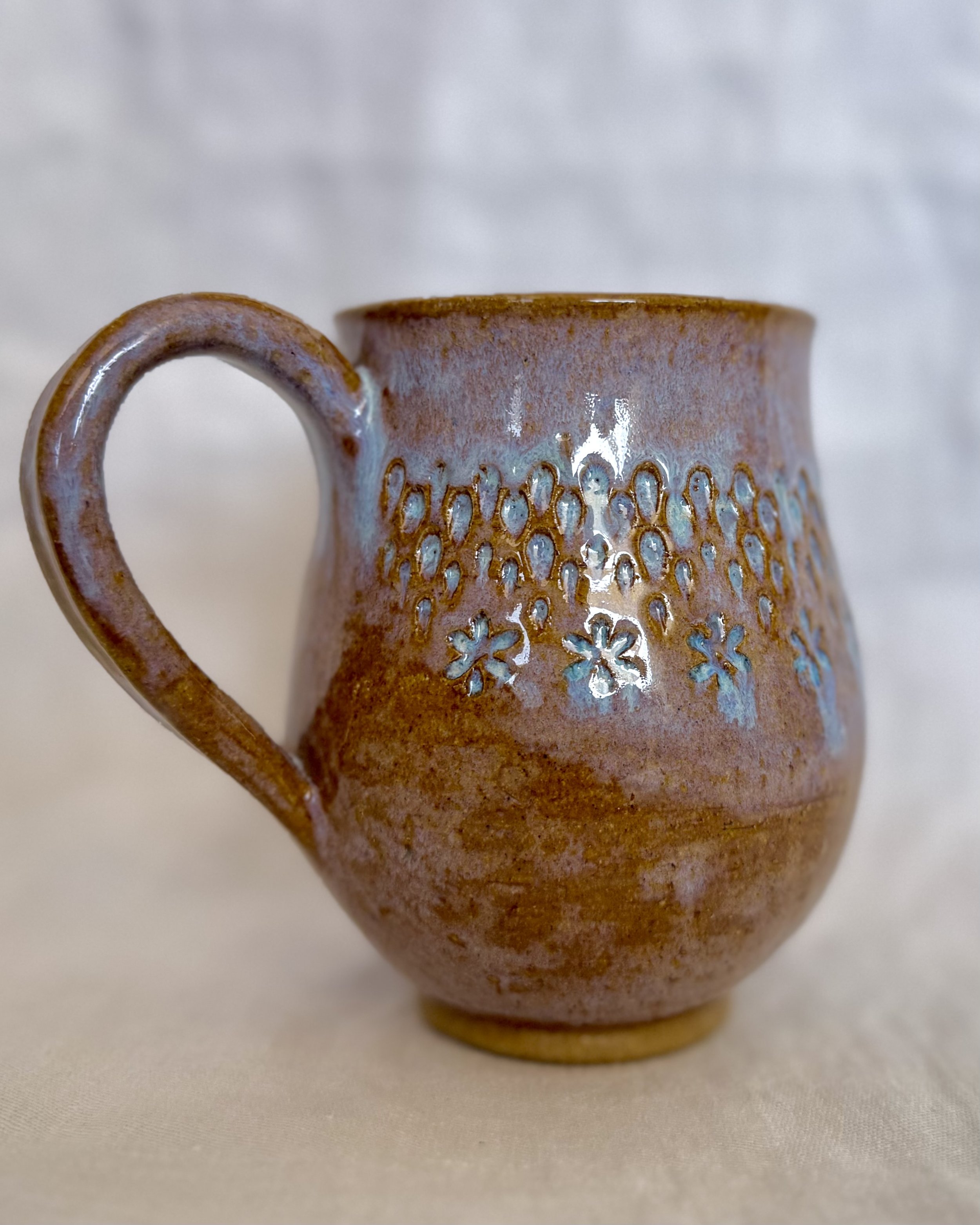 flower carving mug