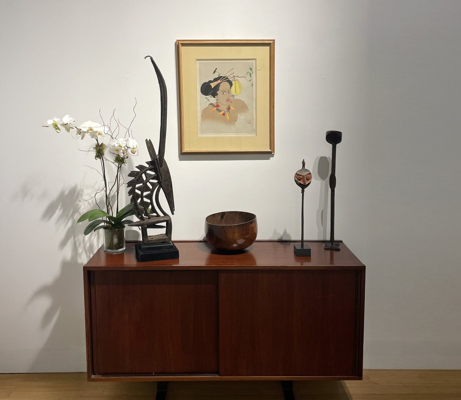 A curated display of African and Oceanic Tribal Art from Bonhams, featuring rare sculptures and traditional artworks from Polynesia, Melanesia, and Micronesia.