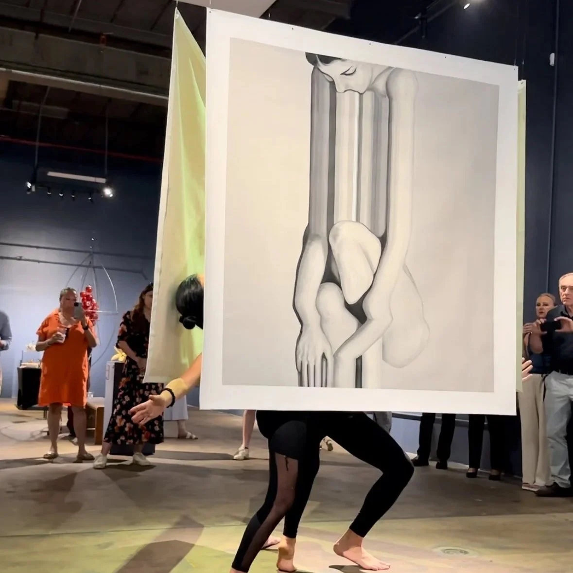 Florence Benichou and Jacopo Arrighi perform inside of Qinza Najm's work