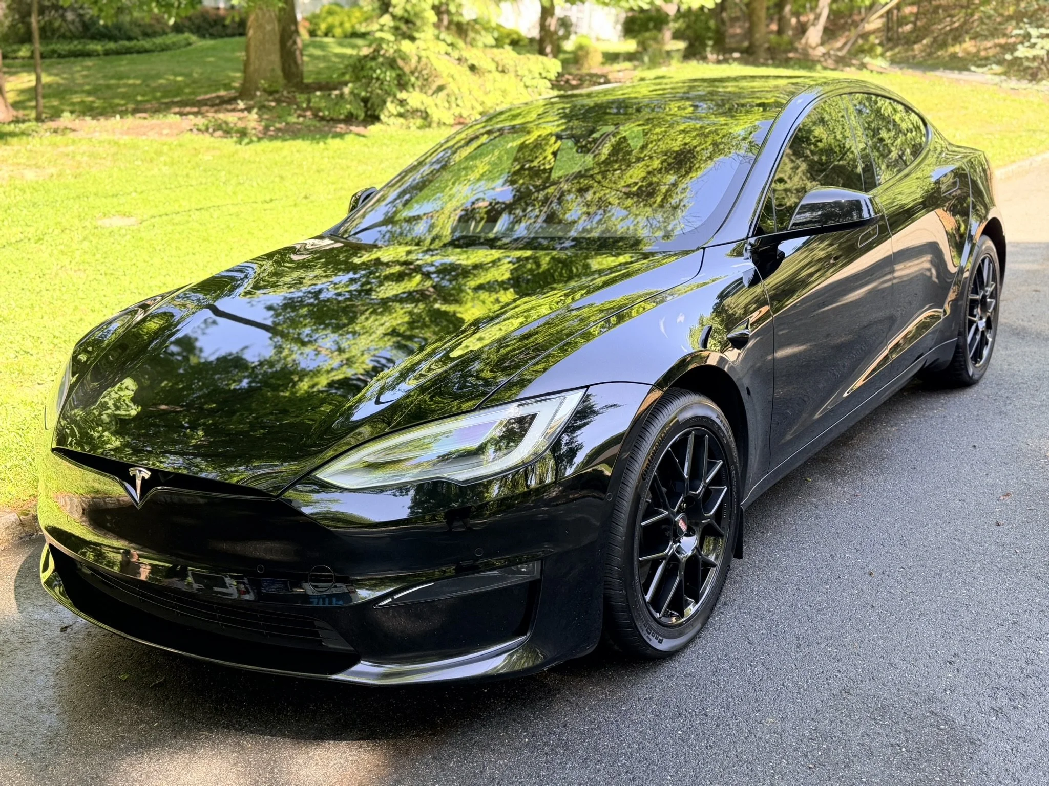 Black Tesla Model S after professional exterior detailing service by Hi-Def Auto Detailing in Roxbury NJ.