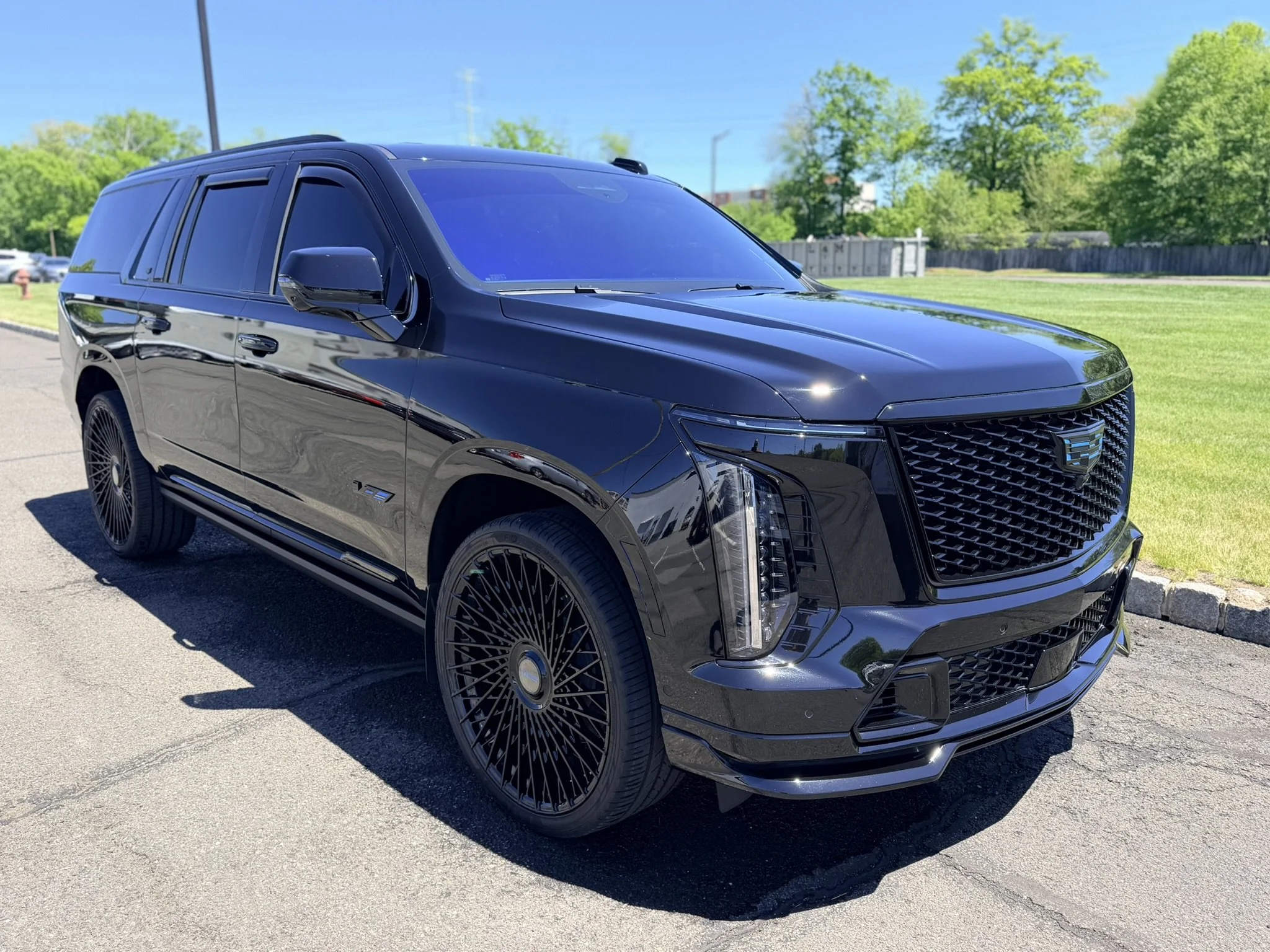 Ceramic coated Cadillac Escalade after professional detailing service.