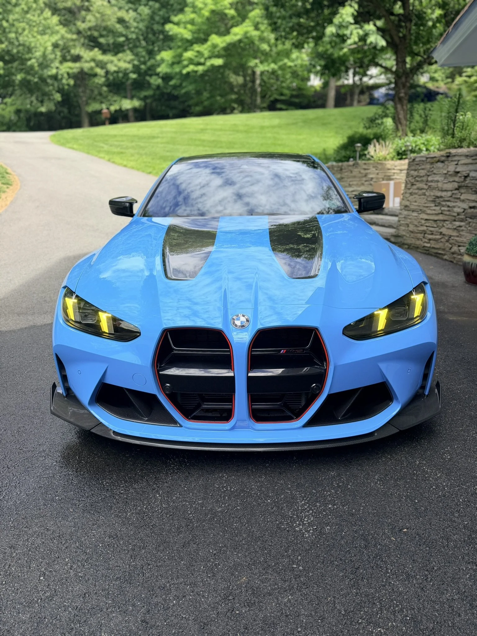 Blue BMW M4 Competition detailed and protected with premium paint enhancement service.