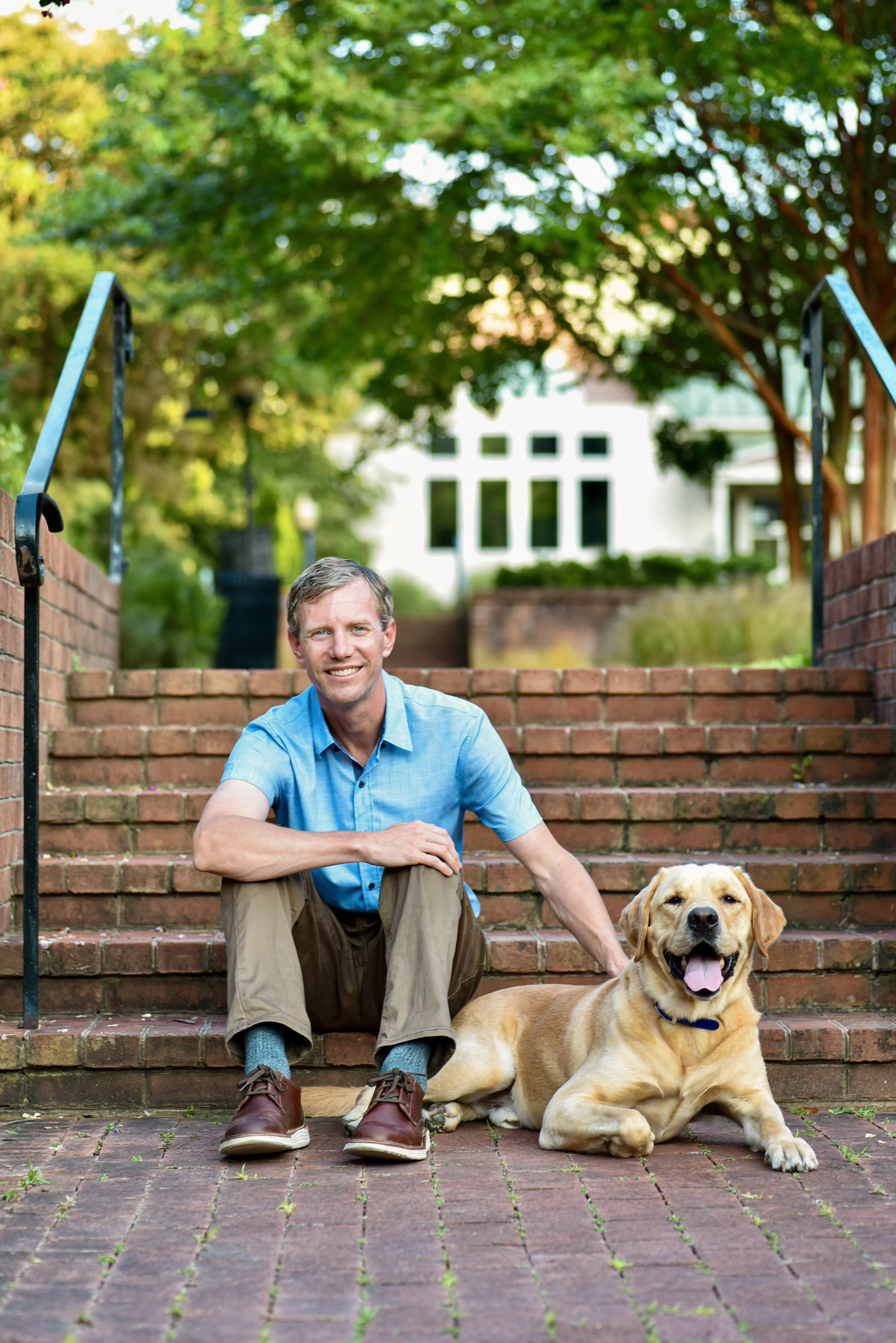Rich Doyle, LCSW-C, therapist and founder of Inner Compass Counseling & Wellness in Annapolis, Maryland, with Buddy, his certified therapy dog