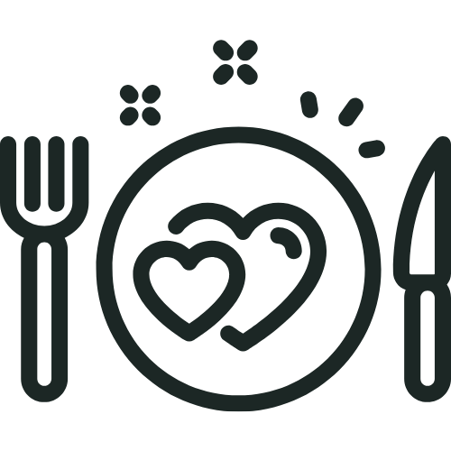 Plate with two hearts, knife, fork, and decorative flowers