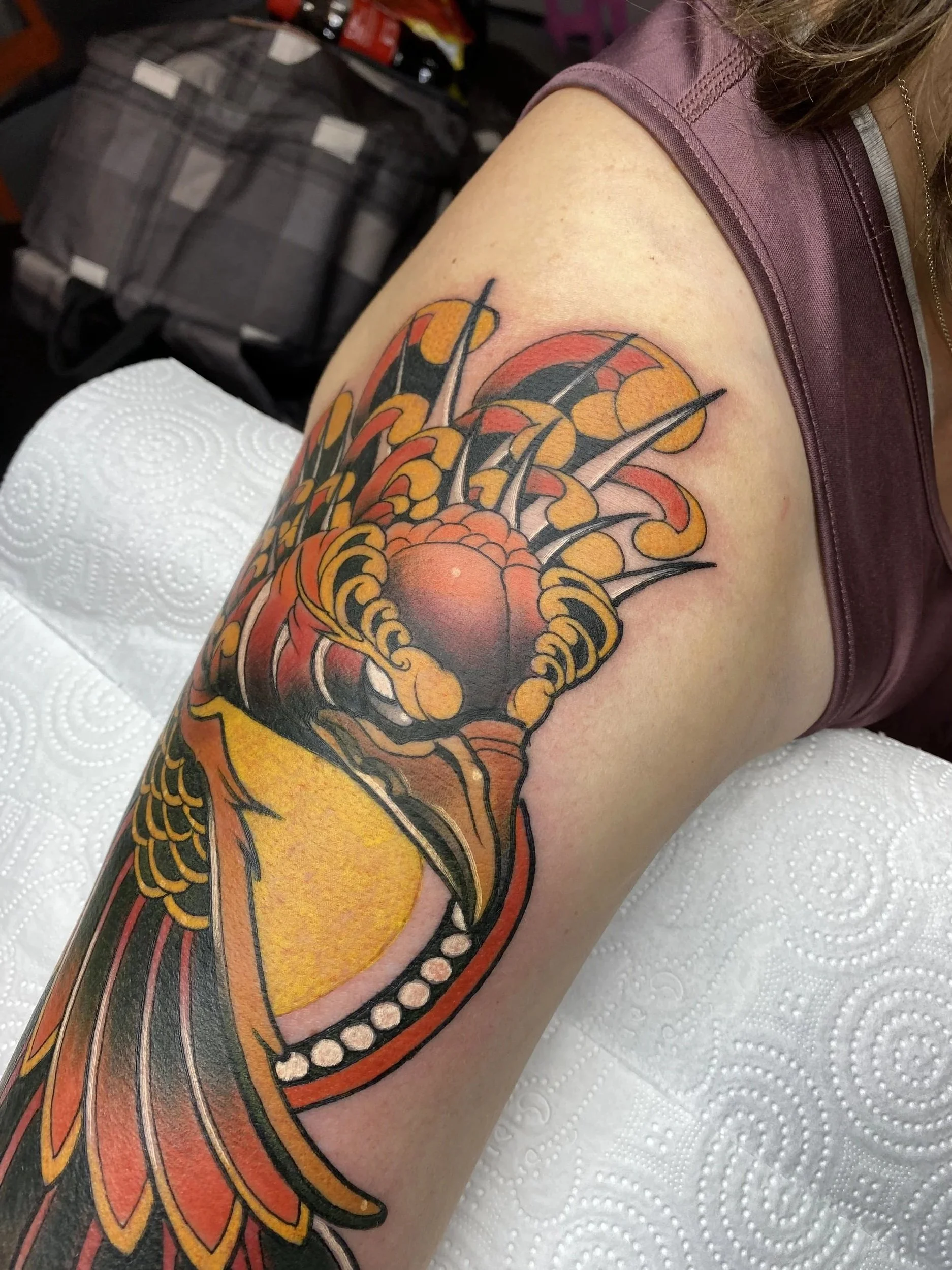 Farverig phoenix fugl tattoo i new school stil lavet af tatovør Bruno Mazallo