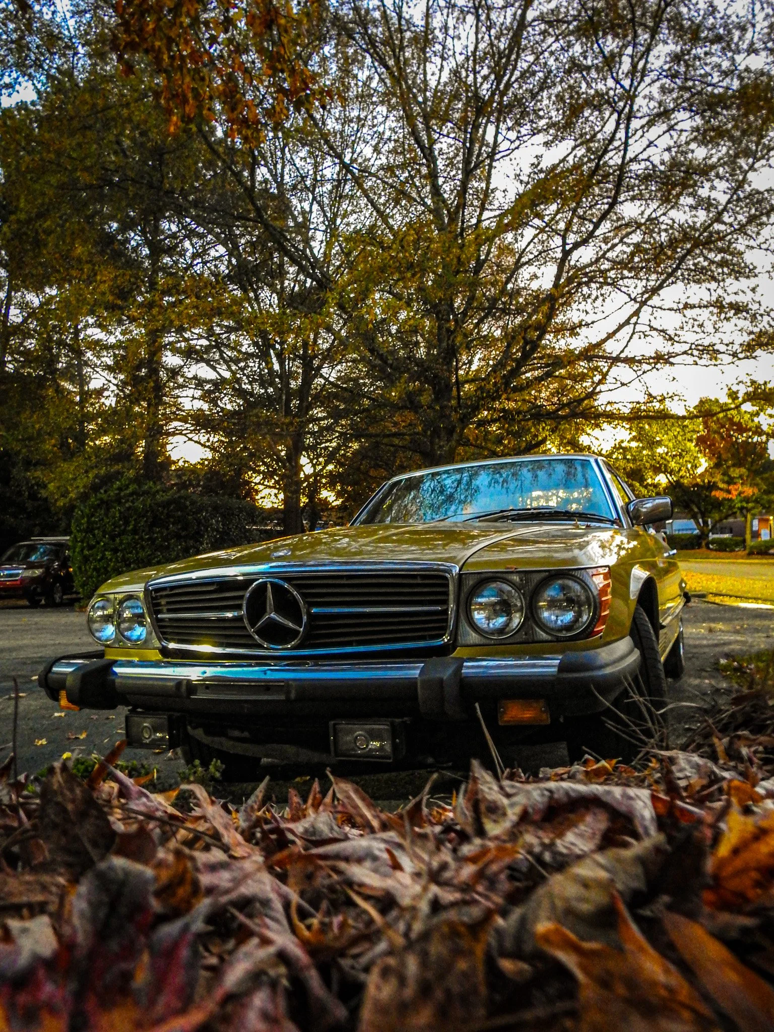 Yellow Mercedes Benz 450 SLC
