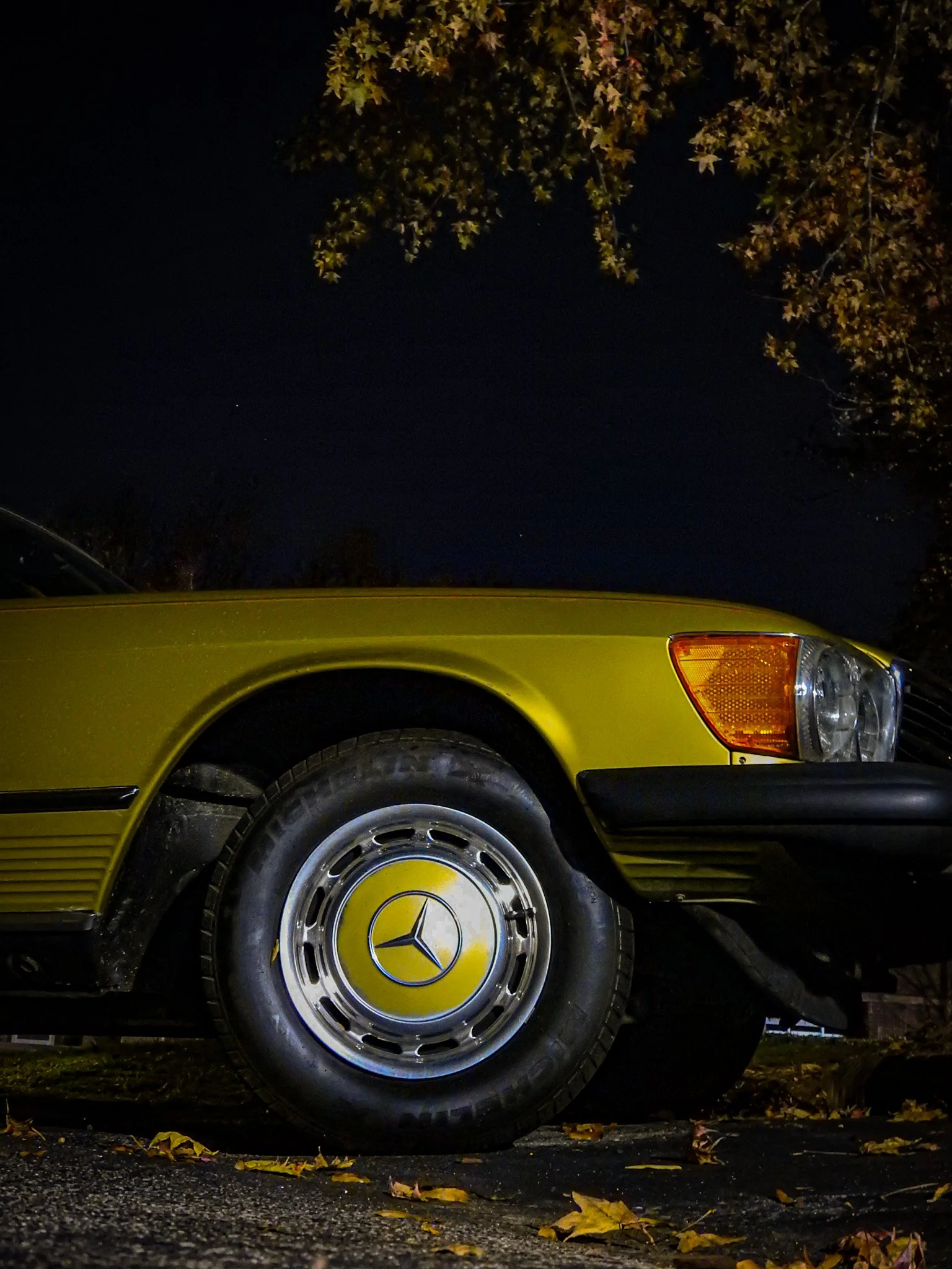 Yellow Mercedes Benz 450 SLC