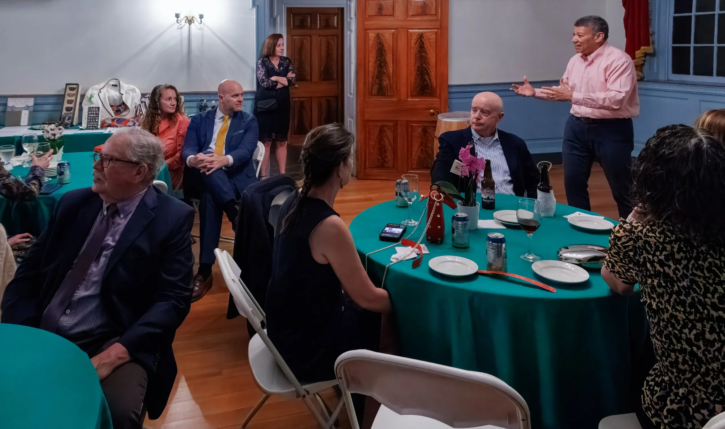 GMTS Spring Fling 2026-RV Addressing Ballroom Crowd -Kathy at Doorway.jpg