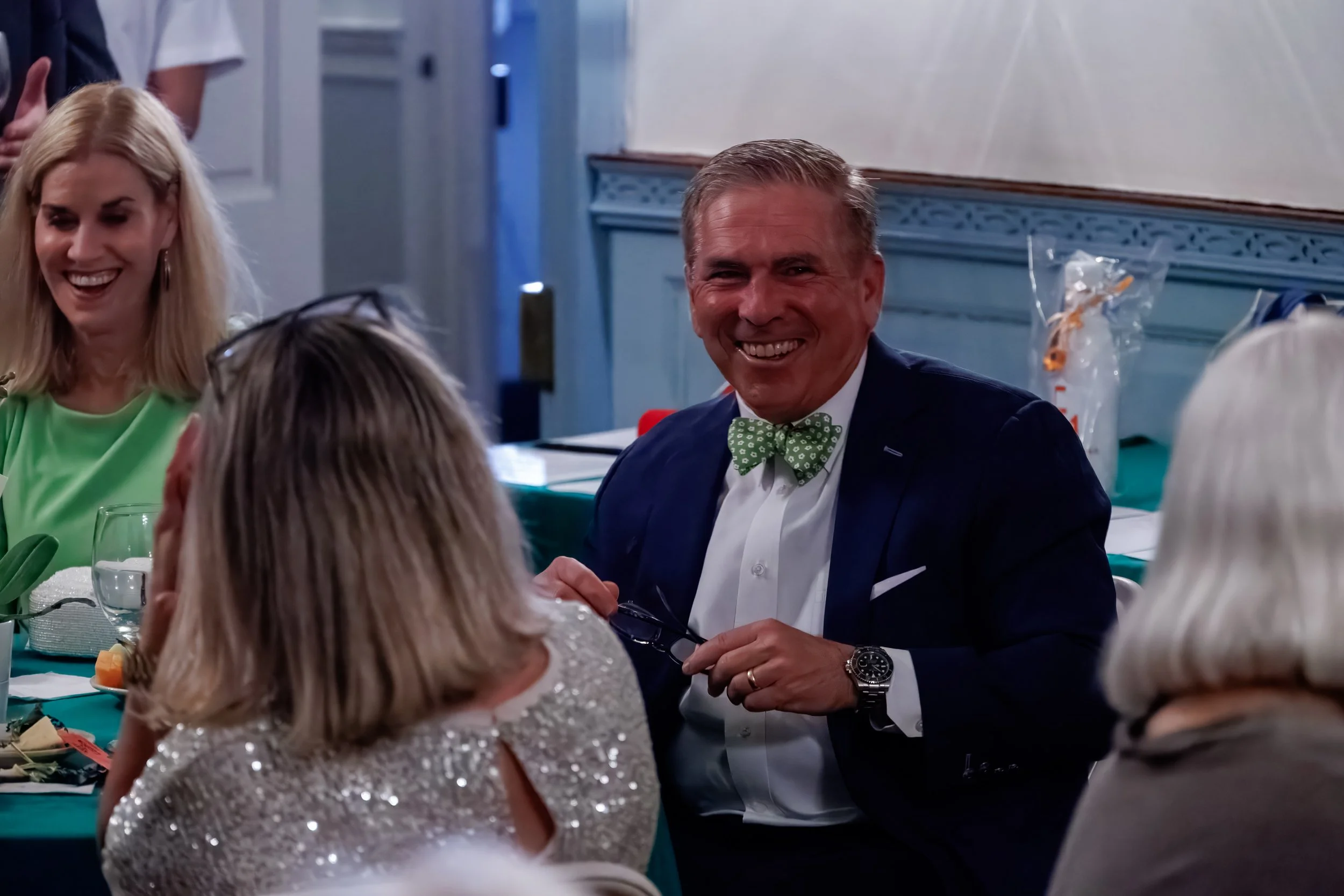 GMTS Spring Fling 2026-Smiling Attendee with Green BT.jpg