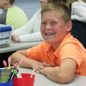 student-at-desk-300x300.jpg