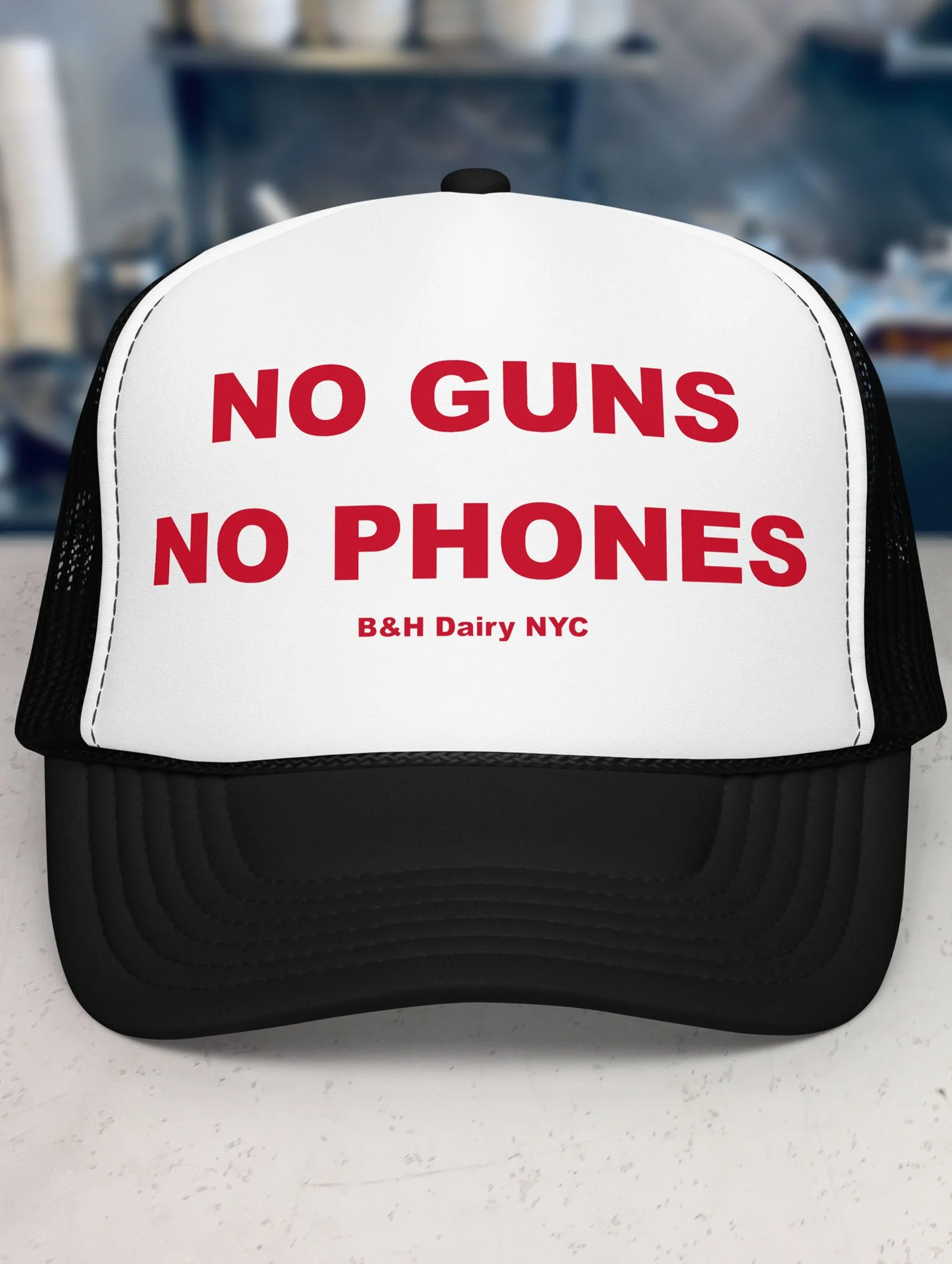 b-and-h-dairy_no-guns-no-phones_trucker-hat_black-and-white_front.jpg