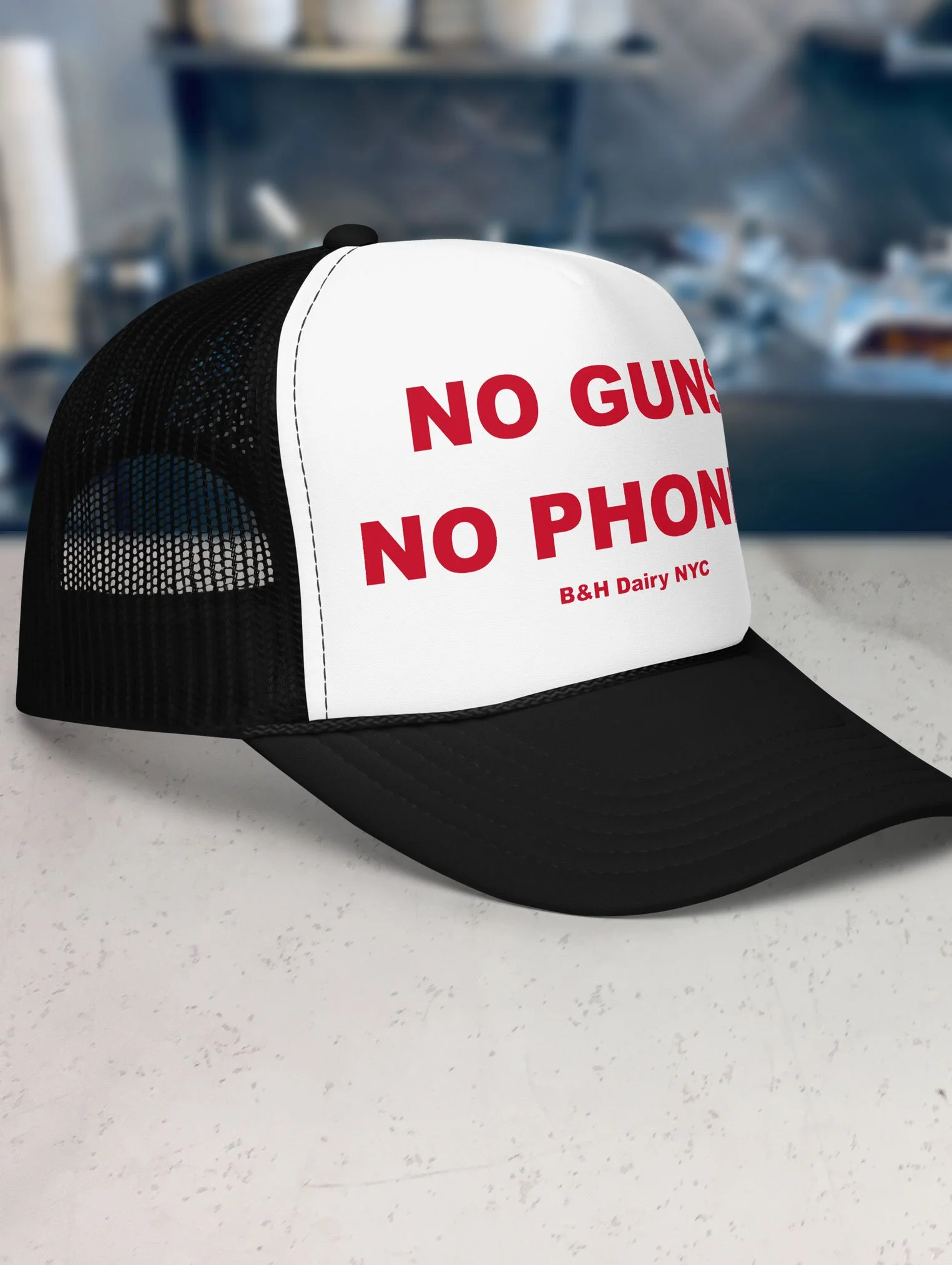 b-and-h-dairy_no-guns-no-phones_trucker-hat_black-and-white_side.jpg