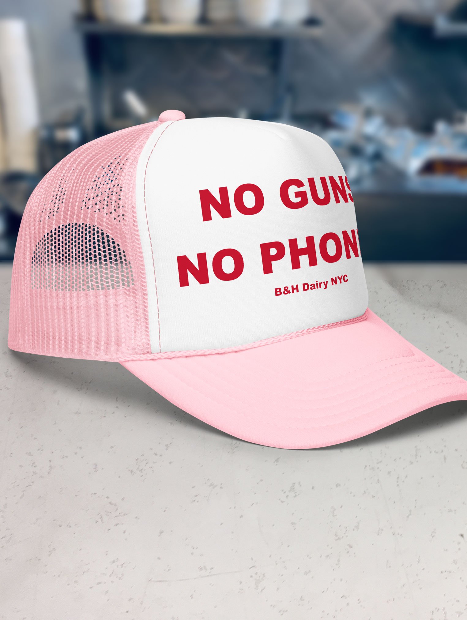 b-and-h-dairy_no-guns-no-phones_trucker-hat_light-pink-and-white_side.jpg