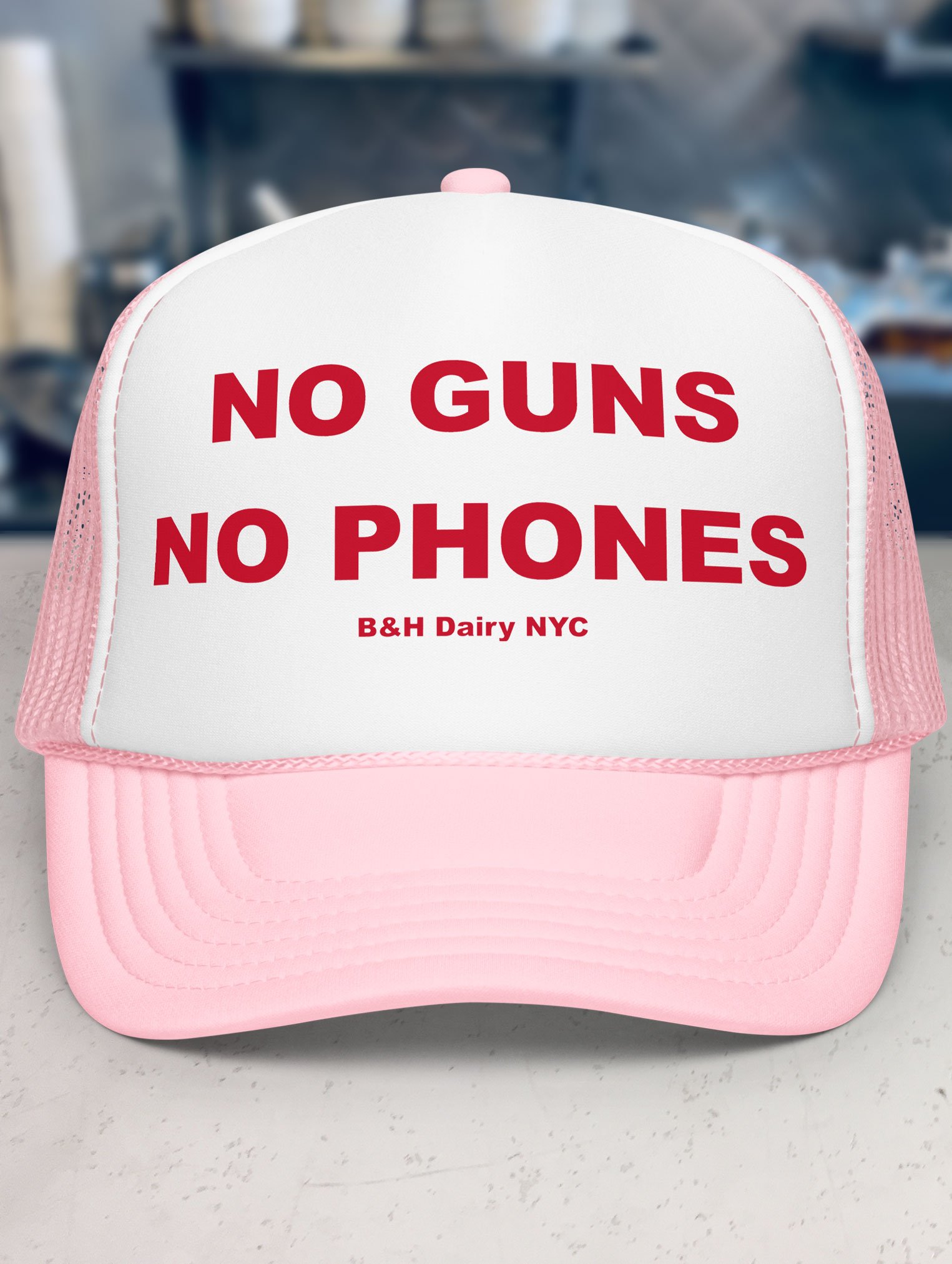 b-and-h-dairy_no-guns-no-phones_trucker-hat_light-pink-and-white_front.jpg