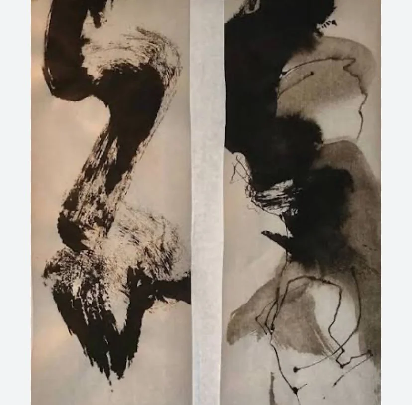 Close-up of a soft pink rose with intricately layered petals.