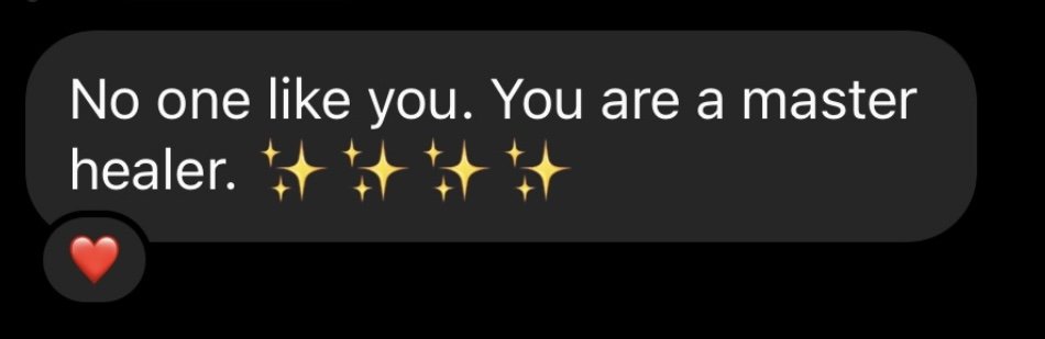 Text message saying, 'No one like you. You are a master healer.' with sparkle emojis and a red heart emoji below.